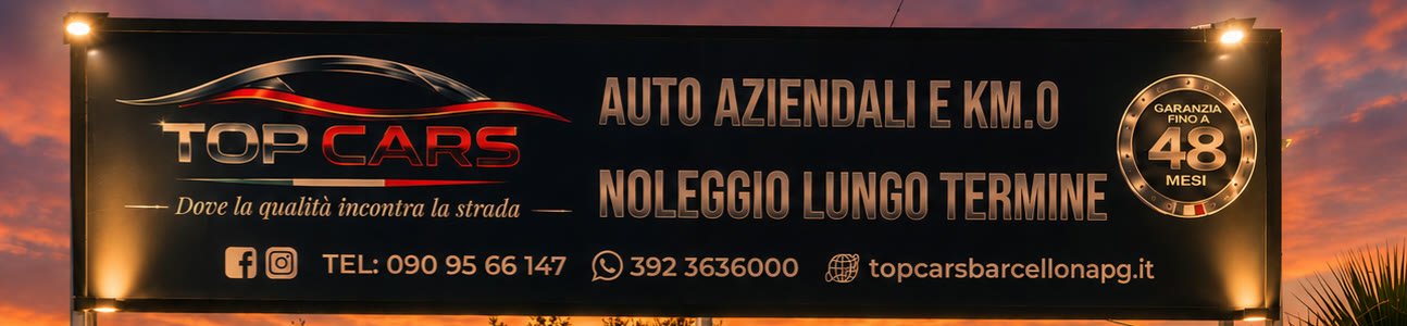 L'insegna illuminata di Top Cars: auto aziendali e km.0, noleggio lungo termine